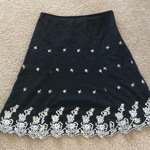 Black skirt with cream embroidered detail
